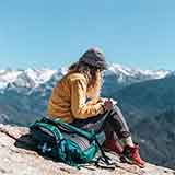 girl sitting on the hills