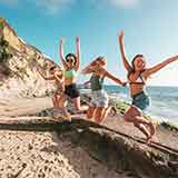girls having fun on beach